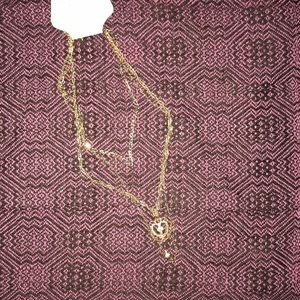 Cute.  Gold layered necklace